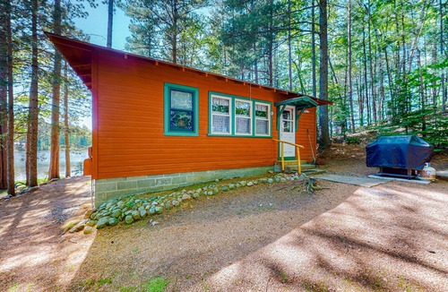 Boulder Junction Cabin | Lakefront cabin with private dock, boat, firepit, fish cleaning house, fireplace