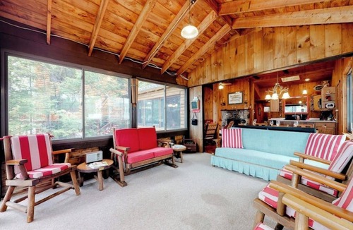 Naples Cabin | Lakefront cabin on Brandy Pond with dock, deck, firepit, kayaks & paddleboard