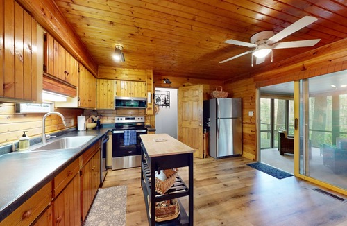 Woodruff Cabin | Lakefront cabin with kayaks, firepit, dock & spacious interior