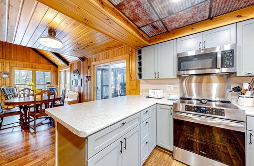Lac du Flambeau Cottage | Lakefront dog-friendly retreat with sauna, dock, canoe, paddle board, & firepit