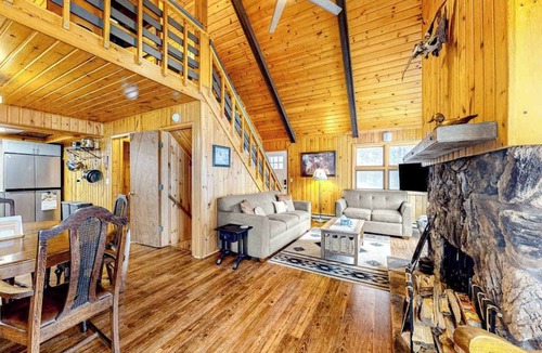 Lac du Flambeau House | Lakefront dog-friendly retreat with sauna, dock, canoe, paddle board, & firepit