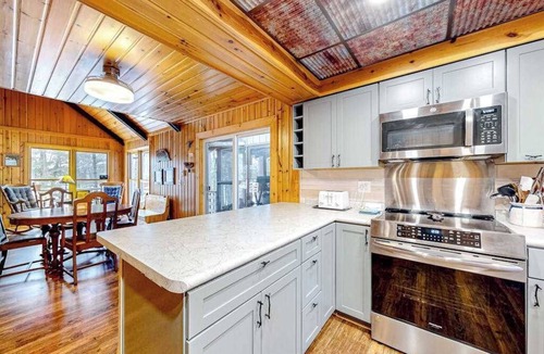 Lac du Flambeau House | Lakefront dog-friendly retreat with sauna, dock, canoe, paddle board, & firepit