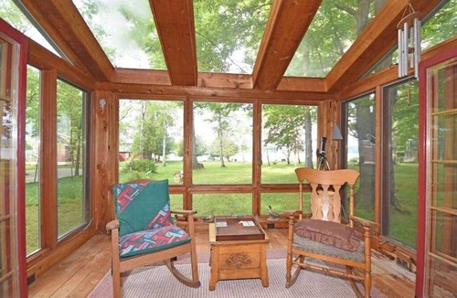 Empire House | Lakefront home on Little Glen Lake with fireplace, deck, gas grill, and firepit