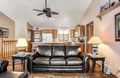 Lac du Flambeau House | Lakefront home with firepit, screened porch, WiFi, central AC, and kayaks