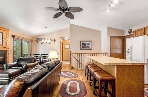 Lac du Flambeau House | Lakefront home with firepit, screened porch, WiFi, central AC, and kayaks