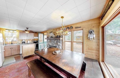 Lac du Flambeau House | Lakefront home with dock, swimming area, & wood stove - sunset views