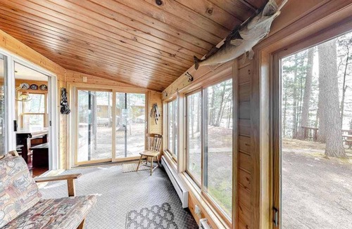 Lac du Flambeau House | Lakefront home with dock, swimming area, & wood stove - sunset views
