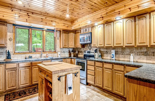 Lac du Flambeau House | Lakefront log cabin on 3.5 acres with dock, gazebo & sunset views - dog-friendly