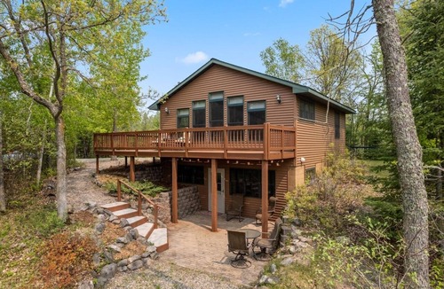 Nevis Cabin | Lakefront retreat on Island Lake. Two cabins, 7 bedrooms, sand beach, privacy+