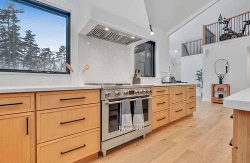 Alfred House | Lakefront Scandinavian Vacation Rental with Private Dock, Hot Tub & Kayaks Brand New, modern home with high end amenities - close to Ogunquit, Kennebunkport and Wells Beaches.