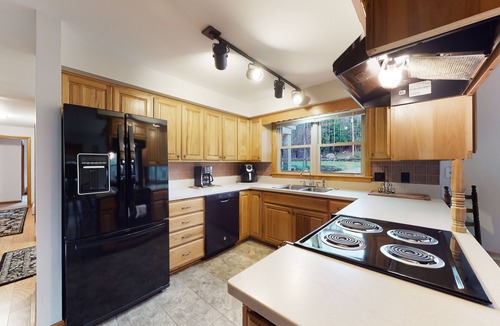 Norway House | Lakehouse home with private dock, firepit, grill, kayaks and canoes