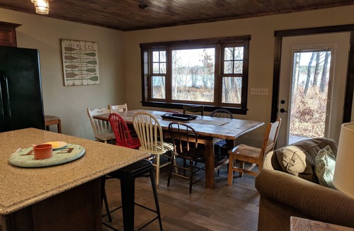 Lake Shore Cabin | Large lake front cabin, has 2 kitchens and comes with a pontoon! Bring the fam!