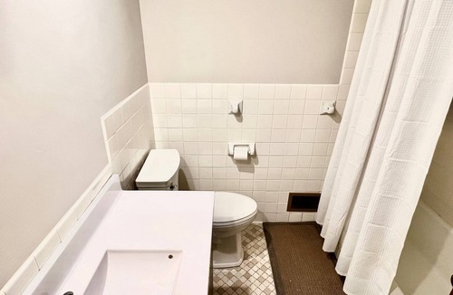 New Hope House | Light Filled Fresh and Clean Corner Lot Mid Century Home with Easy City Access