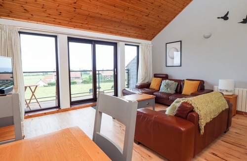 Embleton Cottage | LINKS VIEW, pet friendly, with a garden in Embleton