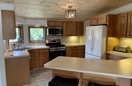 Boyne City House | Located on Porter creek across from Lake Charlevoix. 10 minutes to Boyne Mtn.