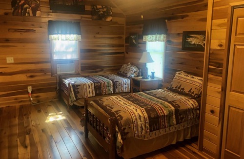 Farmers House | Lofty “Musky Cabin” situated on a hill with musky decor, fire ring, and 2 decks!