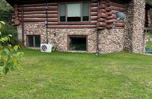 Irma Cabin | Log Cabin on 40 acres with a private lake