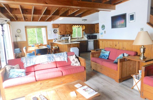 Naples Ski Chalet | Long Lake chalet and guest house with 200' of water frontage and sunset views