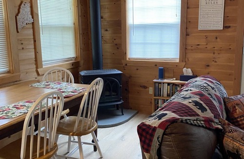 Skowhegan Cabin | Loon Lodge.A charming 2-bedroom cabin in the woods of Skowhegan with AC, WiFi