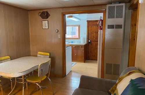 Grayling Cabin | Lovells Riverside Cabin #1 is just steps from the North Branch of the AuSable River with private stair access. You’re also moments from the iconic Lovells Riverside Tavern.