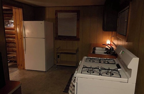 Grayling Cabin | Lovells Riverside Cabin #4 has been a longtime favorite for good reason—peaceful surroundings, gorgeous forest views, and scenic river views. Plus, you’re only moments from local essentials.