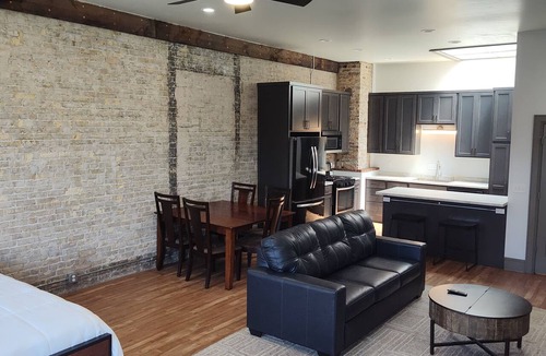 Oshkosh Apartment | Lovely 2nd floor apartment with private rooftop deck near the river on S Main