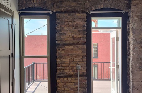 Oshkosh Apartment | Lovely 2nd floor apartment with private rooftop deck near the river on S Main