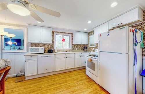 South Sanford House | Lovely lakefront home with deck, fire-pit, grill, private dock & pet friendly