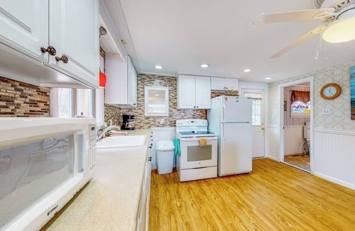 South Sanford House | Lovely lakefront home with deck, fire-pit, grill, private dock & pet friendly