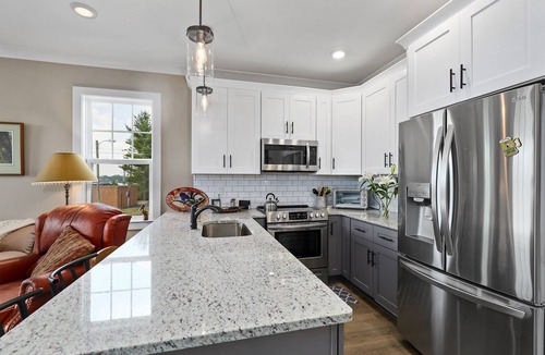 Lakewood House | Lovely townhome with water-view, balcony, central AC & washer/dryer