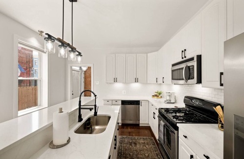 Pendleton House | Lux 4BR Retreat w Hot Tub and Patio Near OTR/DT