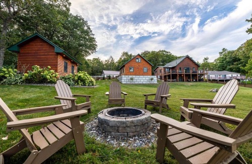 Augusta House | Luxurious Lakefront Log Home with Private Dock and fenced in yard