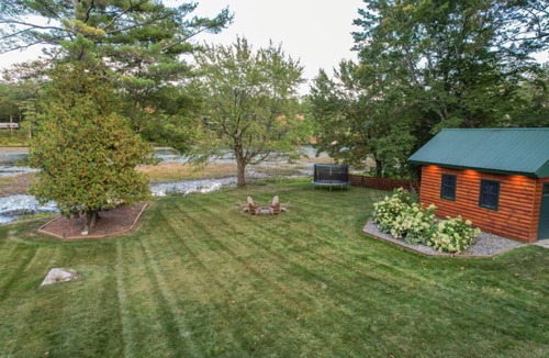 Augusta House | Luxurious Lakefront Log Home with Private Dock and fenced in yard