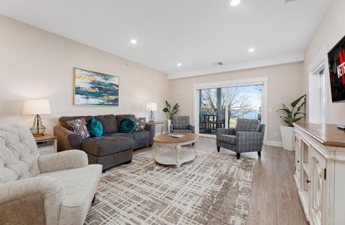 Traverse City Apartment | Luxury Downtown 2BDR Lake View Penthouse Condo steps to Beach 303E