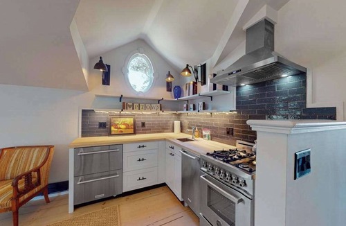 Commercial Street House | Luxury Gallery District home steps from beach with chef’s kitchen & gardens