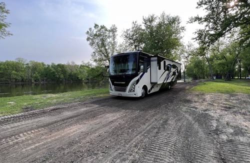 Walker House | Luxury RV with Bunkbeds Stationed on serene Grand River with private golf course