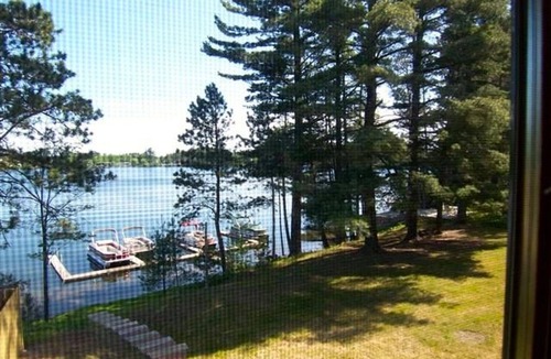 Minocqua House | Luxury Waterfront Lake Minocqua 2 Story Rustic Townhome 3bd garage
