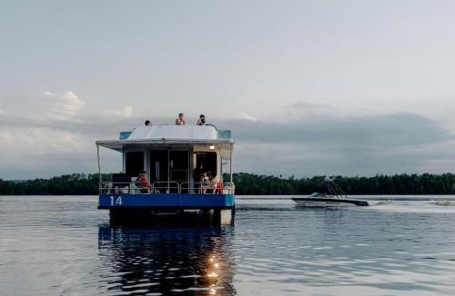 Babbitt Boat Rental | Luxury Wide-Body Houseboat with Flybridge Steering & Water Slide Near Birch Lake, Babbitt, Minnesota