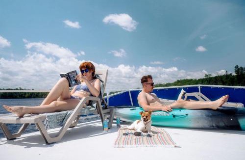 Babbitt Boat Rental | Luxury Wide-Body Houseboat with Flybridge Steering & Water Slide Near Birch Lake, Babbitt, Minnesota