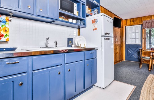 Presque Isle House | Mid-century, lakefront suite with lake view, communal dock, rowboats & firepit