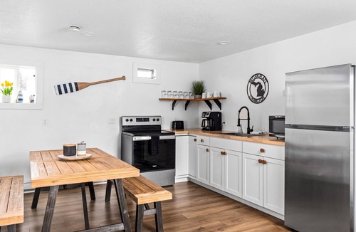 Ludington Apartment | Mitten Flats #5 - 1 Block to the beach! Hot Tub!