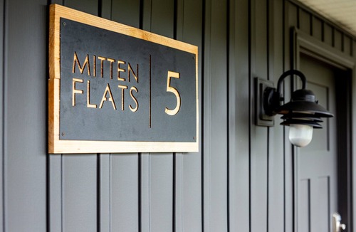 Ludington Apartment | Mitten Flats #5 - 1 Block to the beach! Hot Tub!