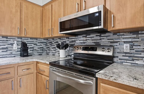 Lake Orion House | Modern 2nd Floor Duplex w/Fenced Yard, Central to Shopping, Dining & GM Orion