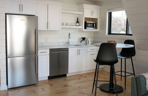 Brewster Cottage | Modern A-Frame cottage with Pool set on a Horse Farm. 5 minutes from the beach!