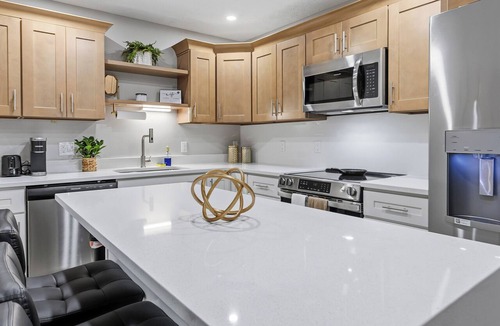 Morgantown Apartment | Modern & cozy 2-BR retreat walking distance to WVU Hospital & Stadium.