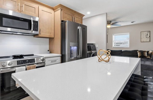 Morgantown Apartment | Modern & cozy 2-BR retreat walking distance to WVU Hospital & Stadium.