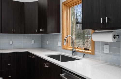 Interlochen House | Modern, custom home with 42-jet Jacuzzi in peaceful, private, wooded enclave