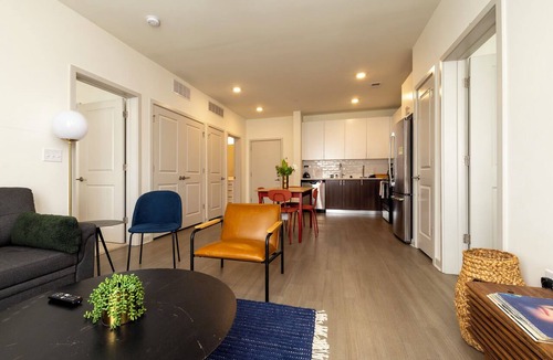 Downtown Louisville Apartment | Modern Nulu 2BR CozySuites 02
