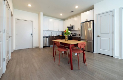 Downtown Louisville Apartment | Modern Nulu 2BR CozySuites 02