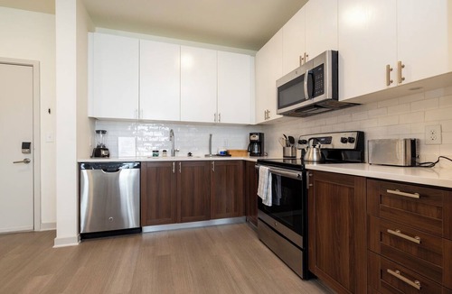 Downtown Louisville Apartment | Modern Nulu 2BR CozySuites 02